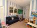 Carpeted and includes laundry area